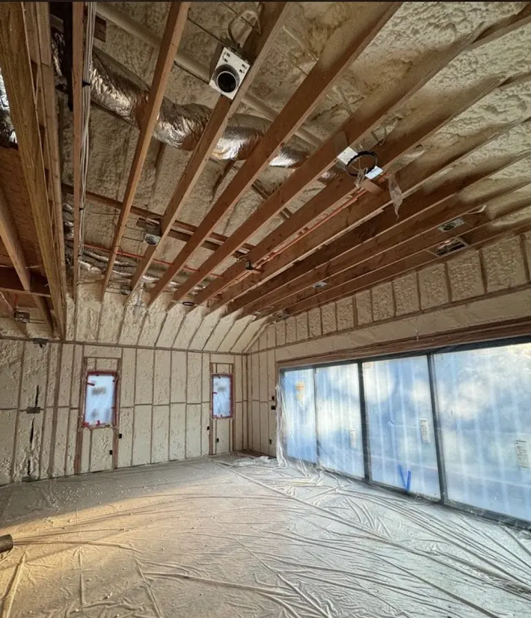 Interior walls and ceiling insulated with spray foam during new construction in Blue Springs